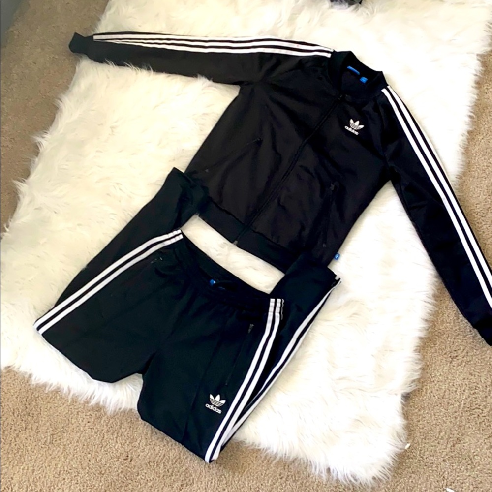 Women’s Adidas track suit.
